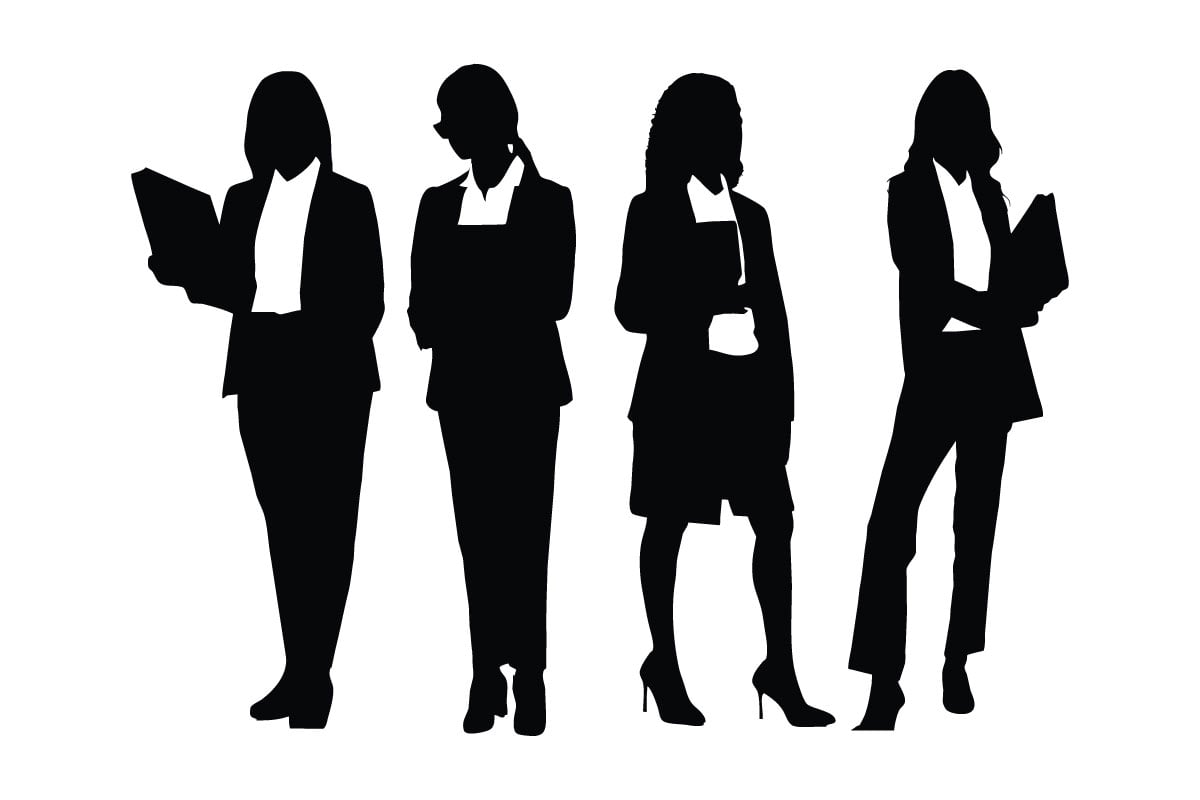 Lawyer girls wearing suits and standing