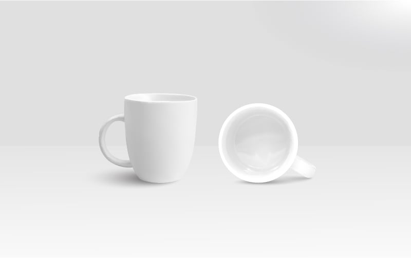 White vector coffee mugs on a grayish surface